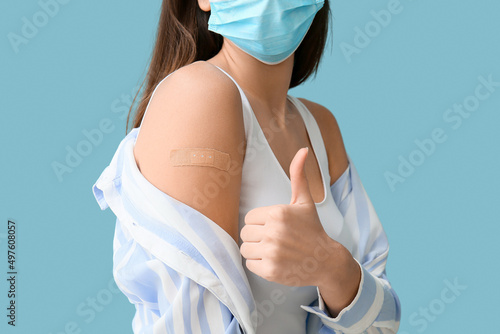 Young woman in mask with ap...