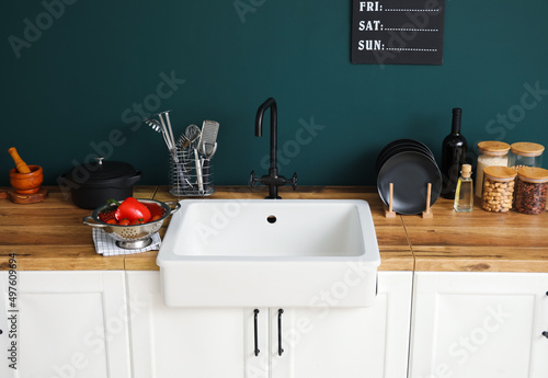 Modern farmhouse kitchen in...