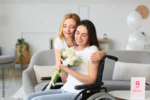 Mature woman greeting her d...