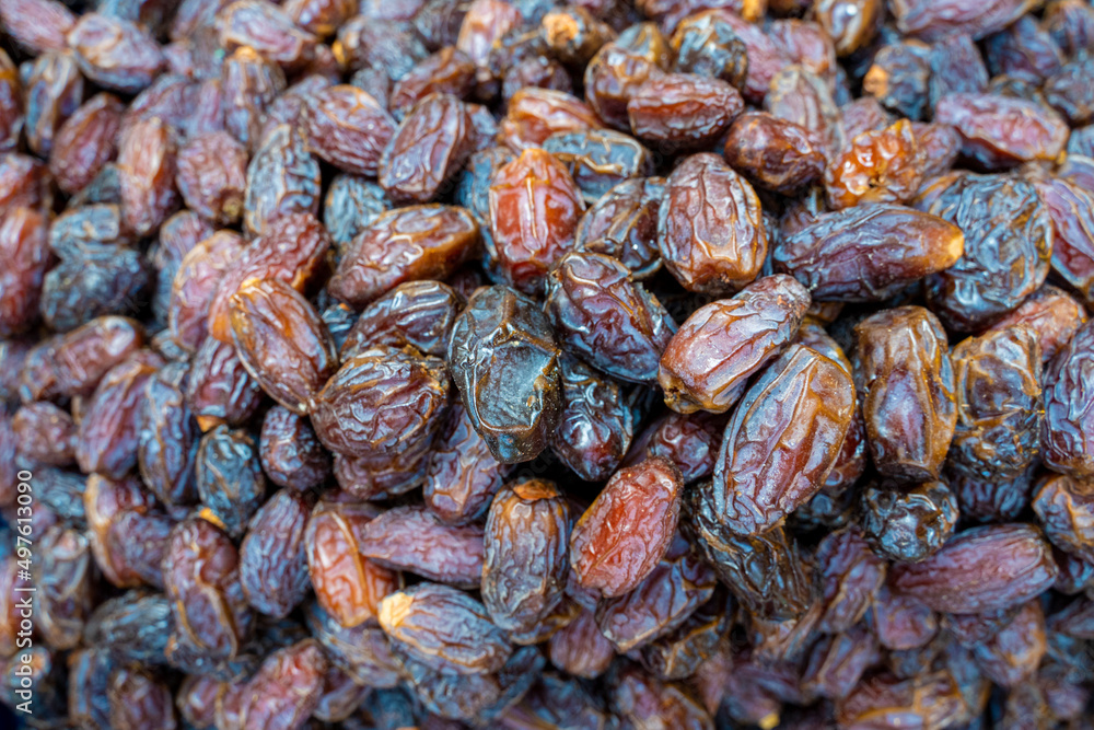 Orange brown dates close up in detail Orange brown dates close up in detail