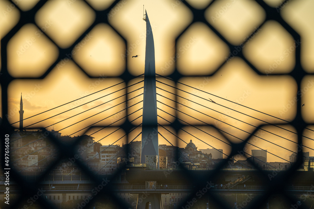 Views of Halic metro bridge in Istanbul city during sunset on a clear summer day Views of Halic metro bridge in Istanbul city during sunset on a clear summer day