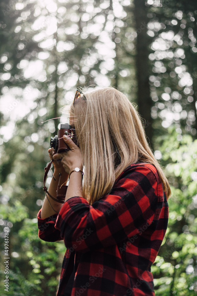 Female Photographer In Forest. Female Photographer In Forest.