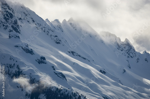 snow covered mountains © corey