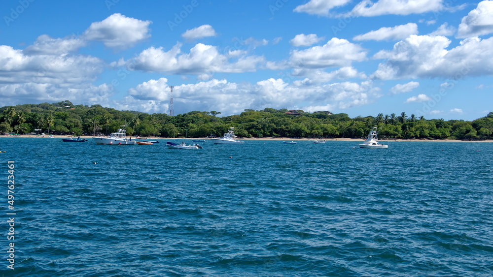Boats moored in the bay in front of Tamarindo, Guanacaste, Costa Rica