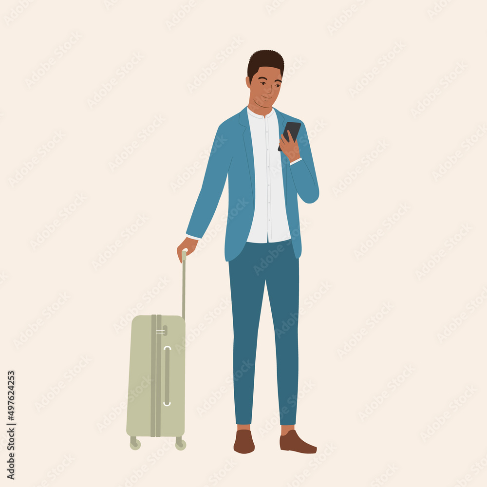Handsome Black Businessman With Luggage Bag Looking At His Mobile Phone.