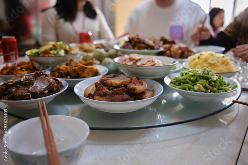 Family Eating Together For Chinese New Year At Home photo