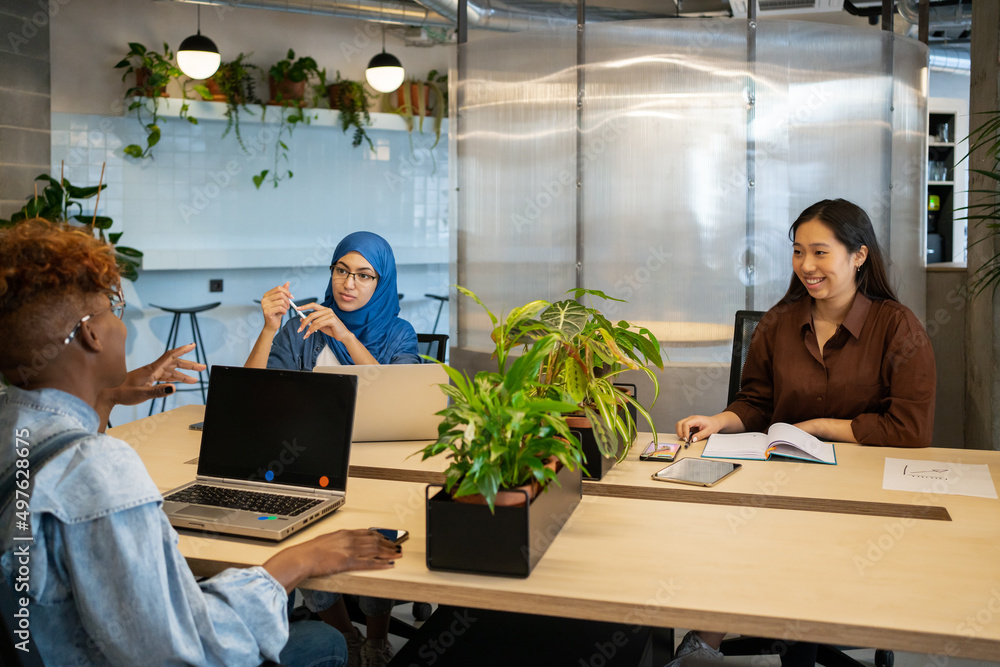 custom made wallpaper toronto digitalBusinesswoman Sitting Around The Desktop In The Office.