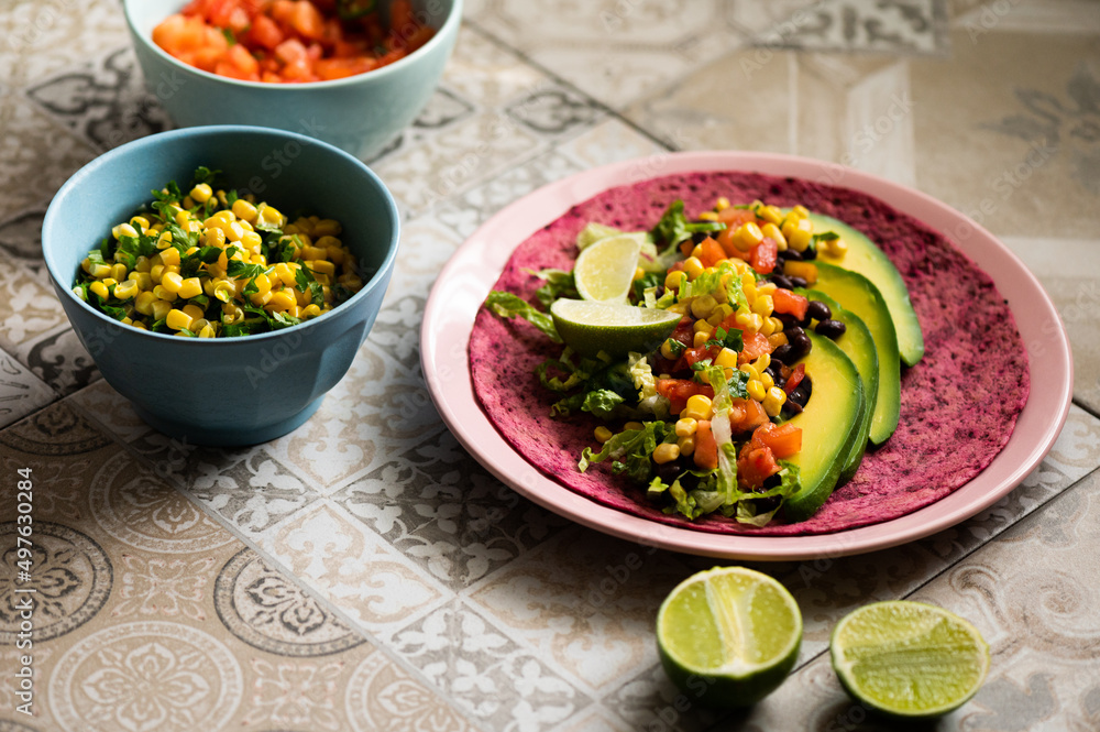 Vegan food: Mexican vegetable tacos with beet tortilla Vegan food: Mexican vegetable tacos with beet tortilla