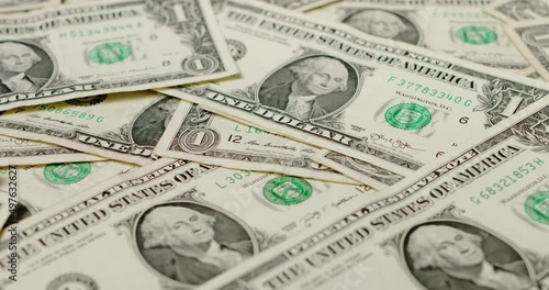 Rotating one Dollar banknotes. 1 US Dollar bills closeup. USA Currency and cash. US Dollar background