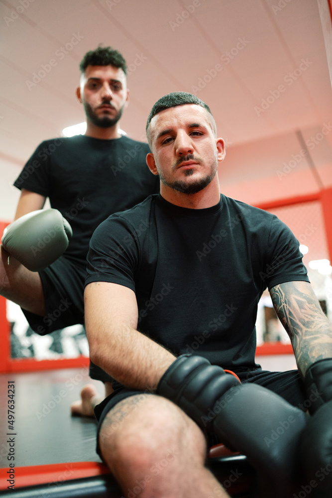Bearded boxer taking break on ring Bearded boxer taking break on ring