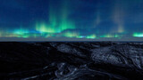 Aurora borealis over the mountains