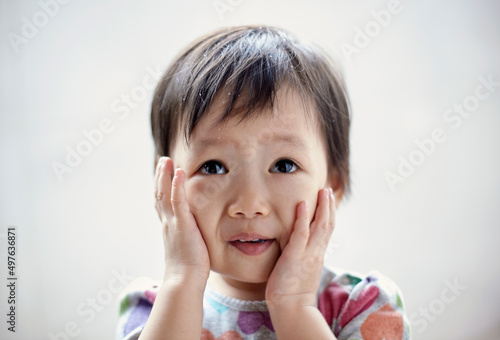 Closeup portrait of funny asian kid

 photo