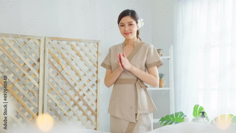 Portrait of Asian young masseuse woman smiling and looking at camera. Portrait of Asian young masseuse woman smiling and looking at camera.