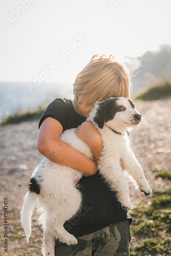 boy loves his dog photo