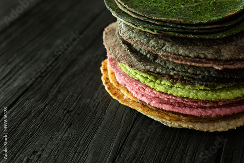stacked tortillas of different colors  photo