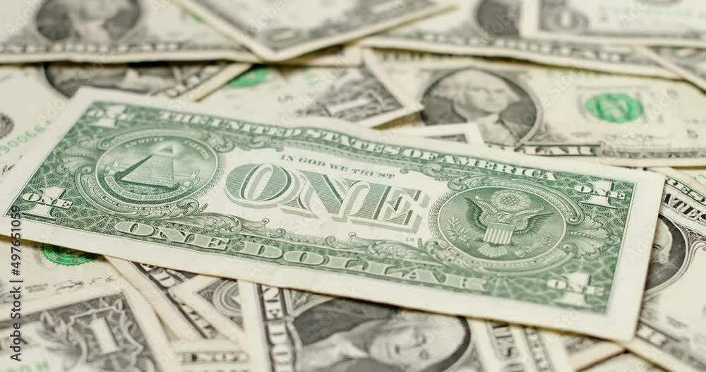 One Dollar banknotes background. US Dollar money and currency. Dollar pattern. Rear side of one Dollar bill One Dollar banknotes background. US Dollar money and currency. Dollar pattern. Rear side of one Dollar bill