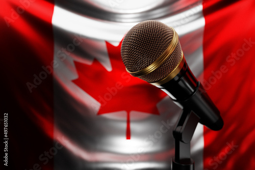 Fotografía Microphone on the background of the National Flag of Canada, realistic 3d illustration