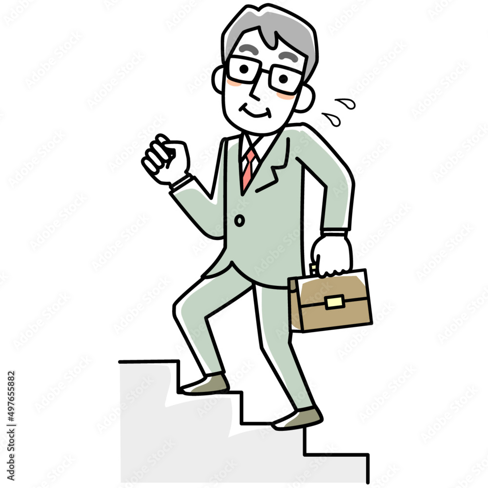 階段を上るスーツ姿のシニア男性