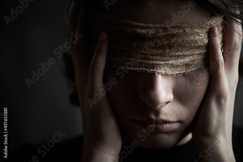 silent blindfolded girl