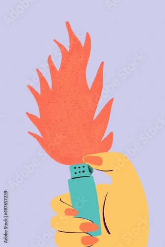 Woman lighting a lighter and making fire photo