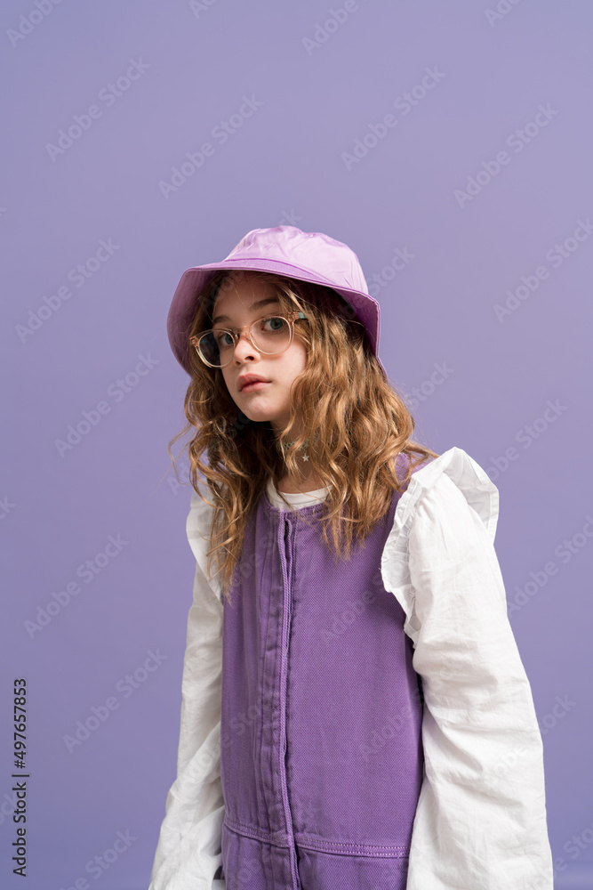 Delicate modern girl modeling in studio Delicate modern girl modeling in studio
