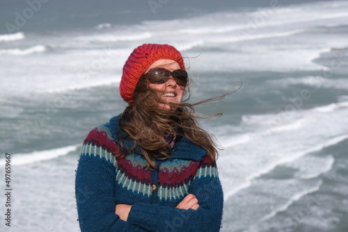 windswept hair at the oceanside