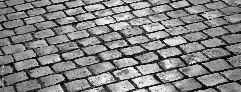 Square paved with many setts also called SANPIETRINI in Italian Language
