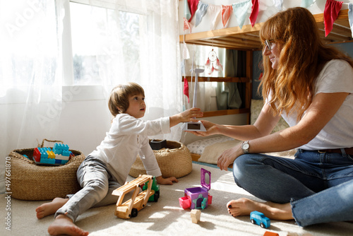 Playtime with mother  photo