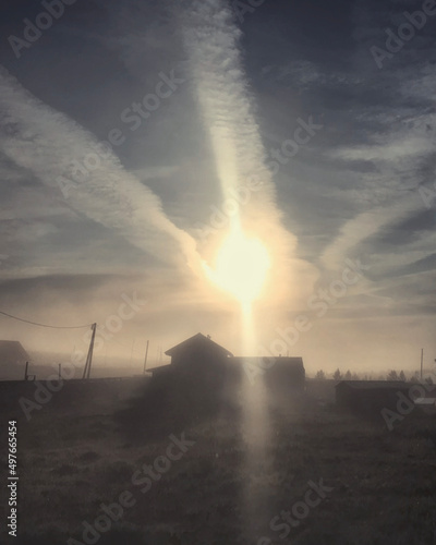 rural landscape on sunset sky background