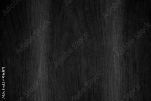 Black vintage painted plywood boards wall antique old style background. Grunge dark old wood texture hardwood decoration.