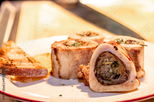 Quadro em tela Baked beef bones with bone marrow are on a plate
