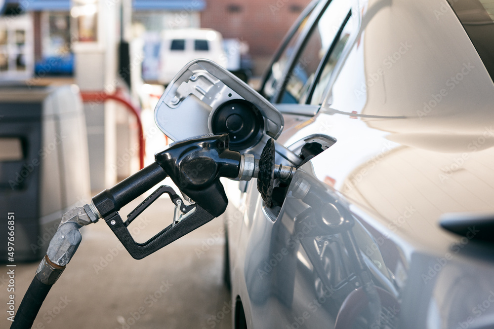 Gas Nozzle Filling Up Car Tank Gas Nozzle Filling Up Car Tank