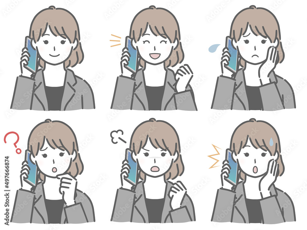 スマホで話すスーツの若い女性