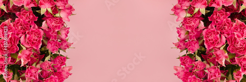 Lush summer pink tiny spray roses as frame on soft light pastel pink background, top view, copy space. Spring flowers banner for website, advertising, poster, card, flyer. © finepoints