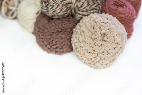 knitting hobbies of yarn ball for background. colorful wool balls of knitted yarn. The concept of handmade work, needlework and the sale of thread. Top view.Flatlаy.Rainbow layout. Copy space..