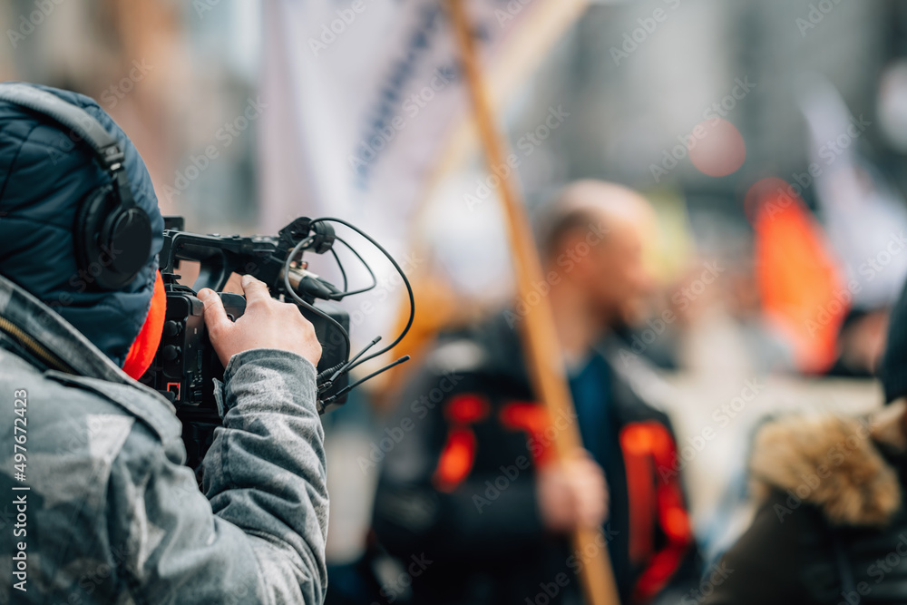 News crew reporting from the streets during public protests Stock Photo ...