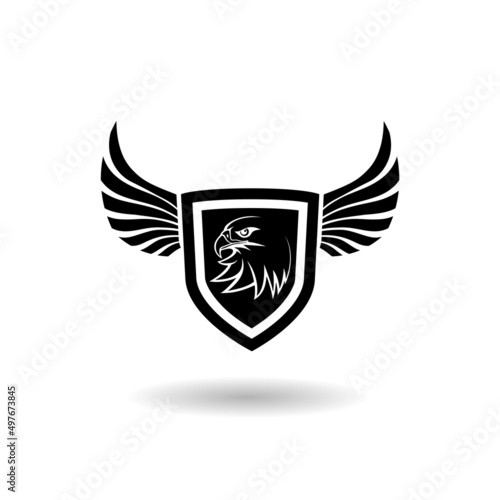 Eagle head in a shield icon with shadow