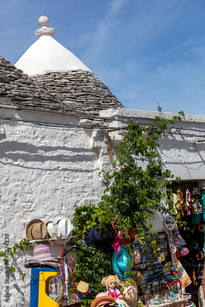 Apulia Symbol Souvenir shop in traditional white trulli house with conical roofs and ...