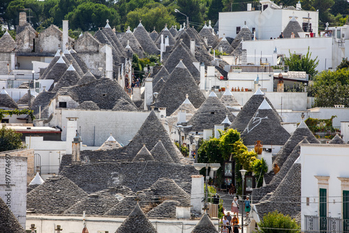  Tradtional white houses in Trulli village. Alberobello, Italy. The style of construction is specific to the Murge area of the Italian region of Apulia