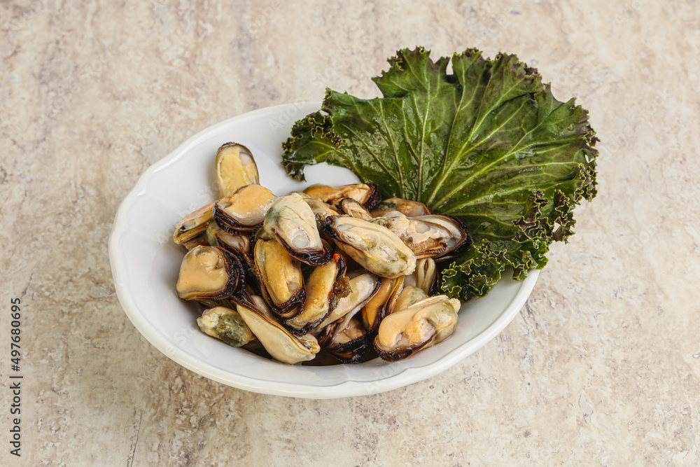 Tasty marinated mussels in the bowl Tasty marinated mussels in the bowl