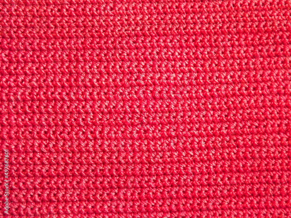knitted fabric in red color as a background knitted fabric in red color as a background