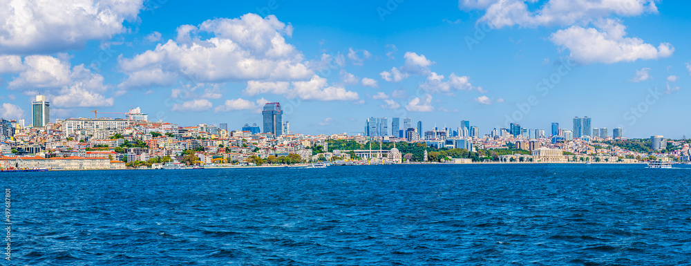 Obraz premium Istanbul, Turkey - September 2019: Panorama of the modern European side; Istanbul cityscape on the banks of Bosphorus strait