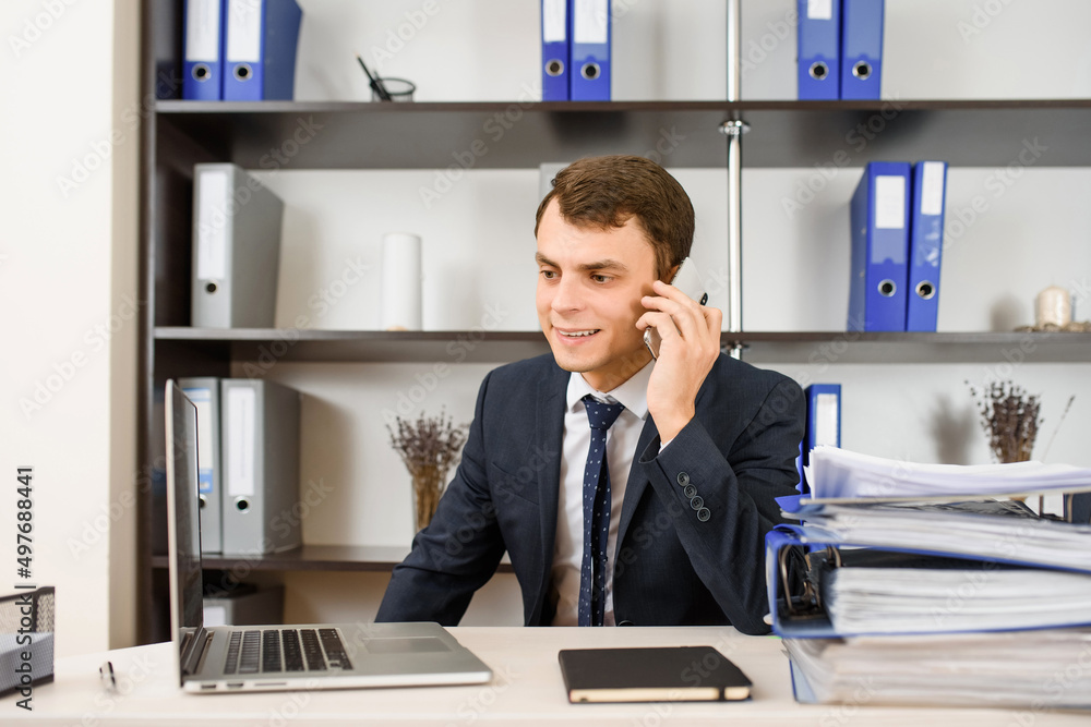 smiling man sales manager is happy for the successful sale and sign contract.. smiling man sales manager is happy for the successful sale and sign contract..