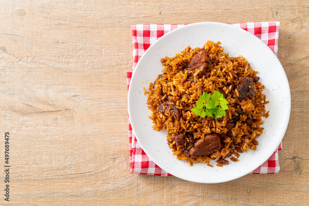 Nasi goreng - fried rice with pork in Indonesia style Nasi goreng - fried rice with pork in Indonesia style