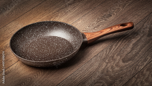 Modern frying pan with non-stick granite coating