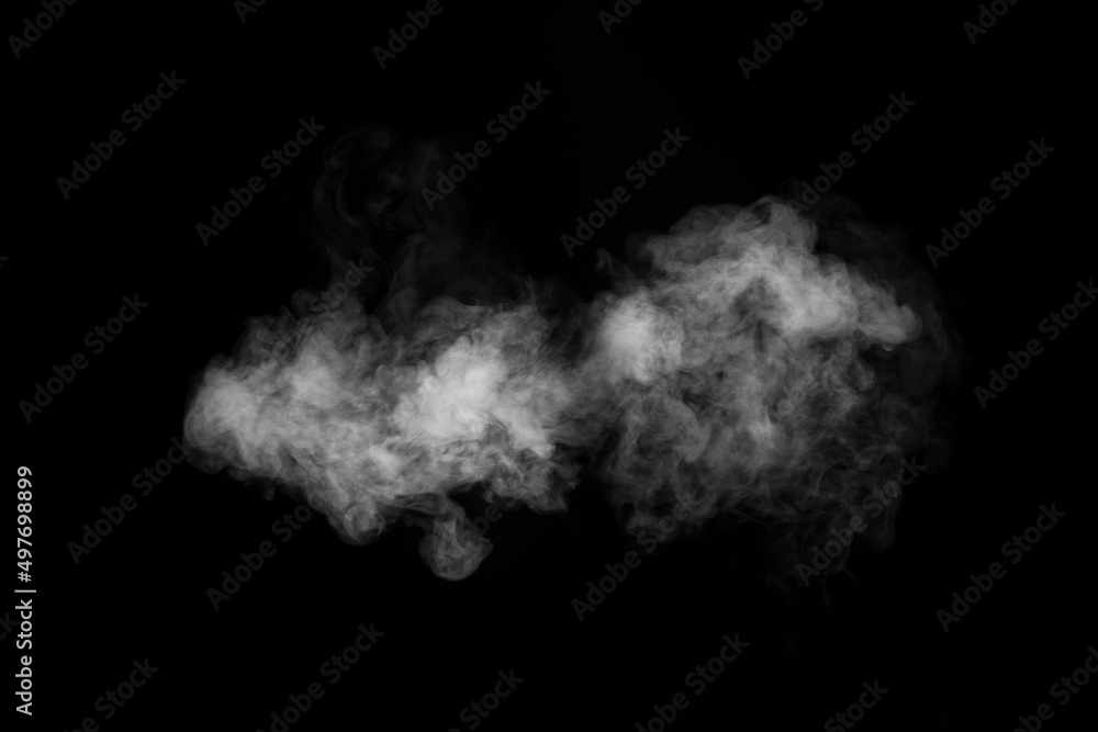 Swirling, wriggling smoke, steam, isolated on a black background for overlaying on your photos. Fragment of horizontal steam