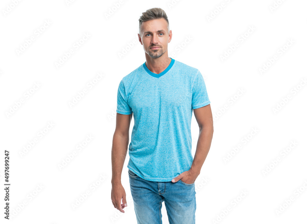 Serious handsome middleaged man in casual style keeping hand in pocket isolated on white Serious handsome middleaged man in casual style keeping hand in pocket isolated on white