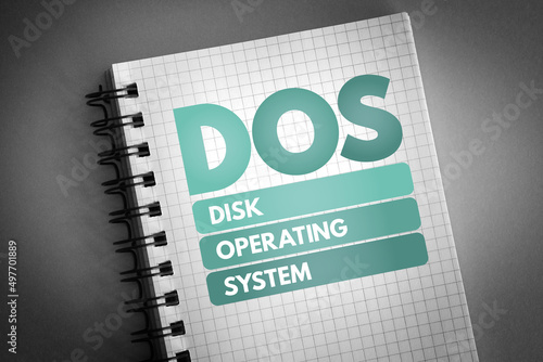 DOS - Disk Operating System acronym on notepad, technology concept background photo