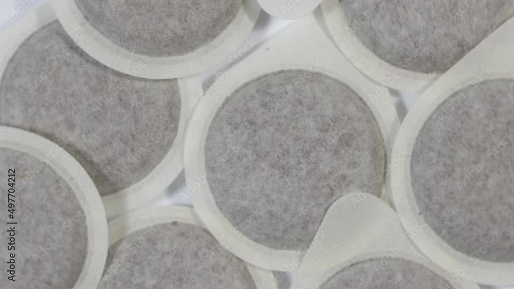 Coffee pods rotating. Top down view Coffee pods rotating. Top down view