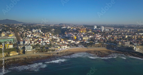 small beach at Estoril with some waves viewed from sky
